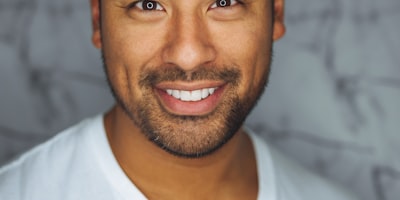 本周社区之星用户头像，一位面带微笑的男性体育爱好者